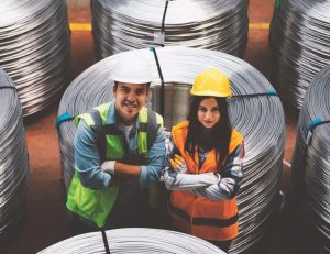 man and woman in warehouse
